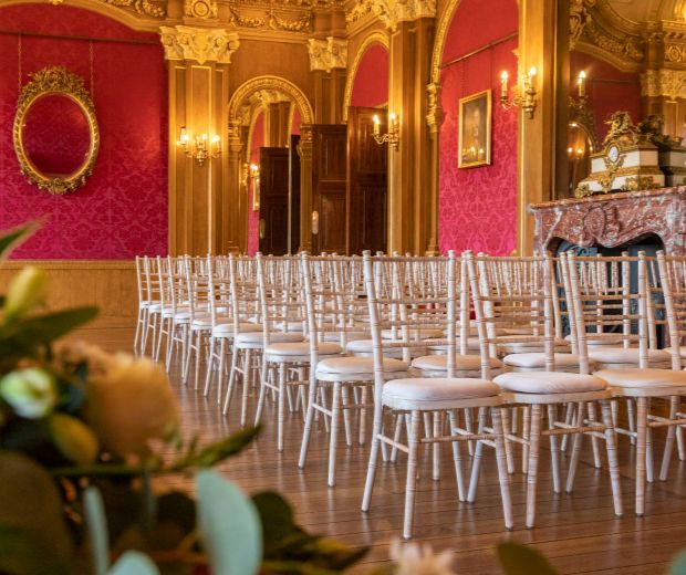 The Banqueting Room of Hylands House set up for a wedding ceremony. 