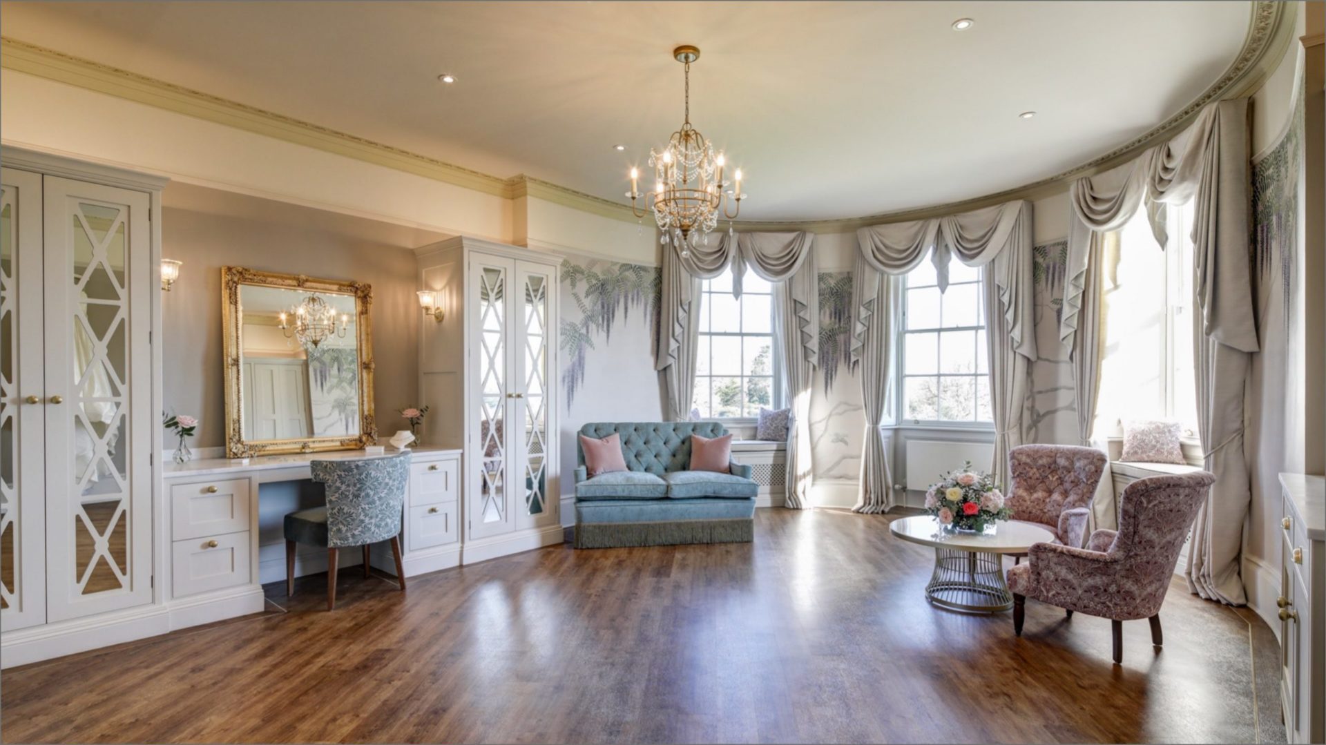 Hylands Estate Wedding Suite Wisteria Room with seating areas and a makeup station. 